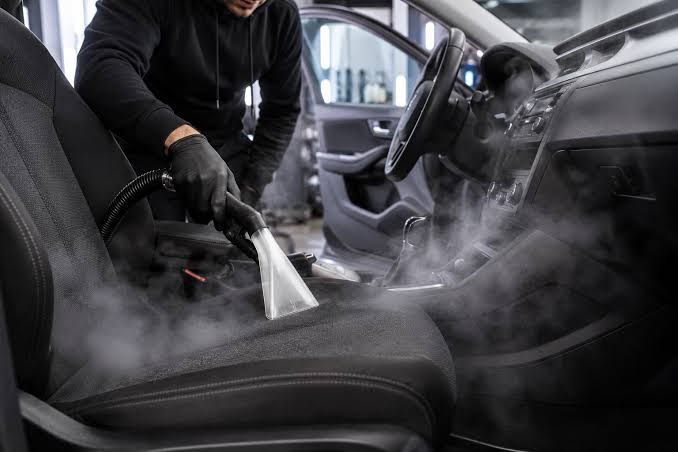 Steam extraction of a car seat during odor removal